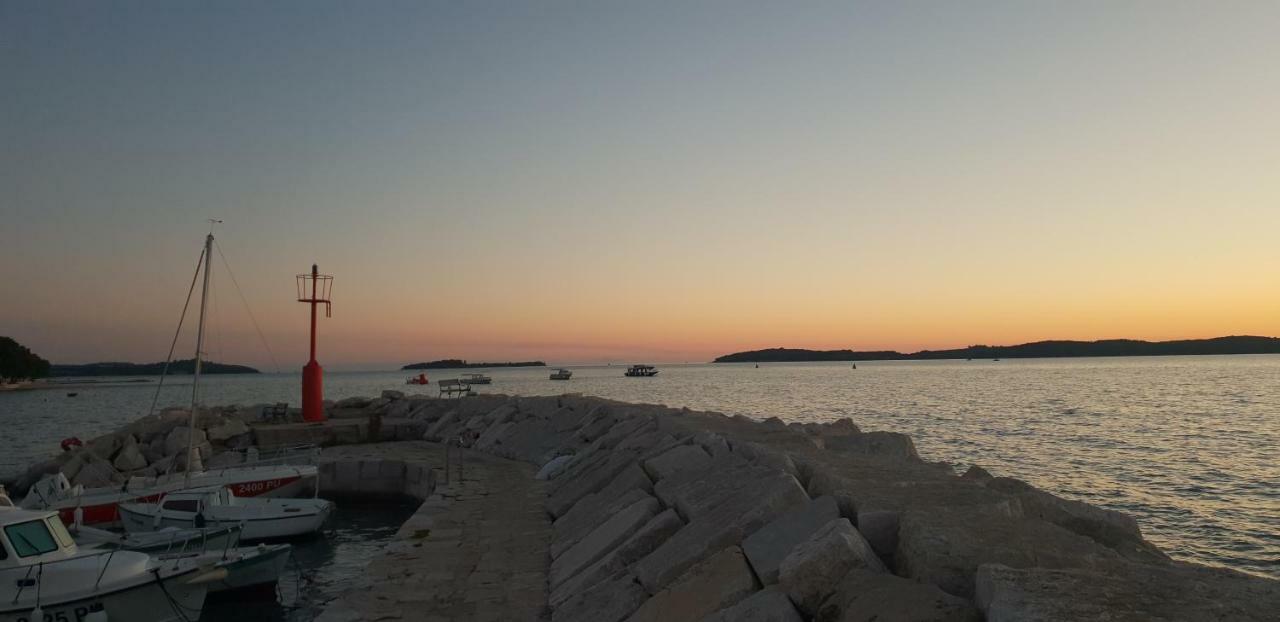 Apartmani Slavulj Fažana Buitenkant foto